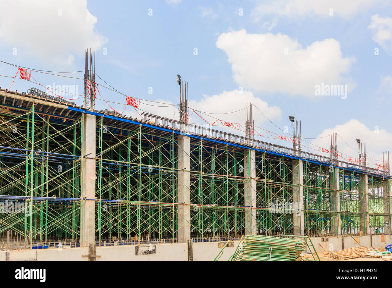 Scaffolding used as the temporary structure to support platform, form work and structure at the construction site. Also used it as a walking platform  Stock Photo