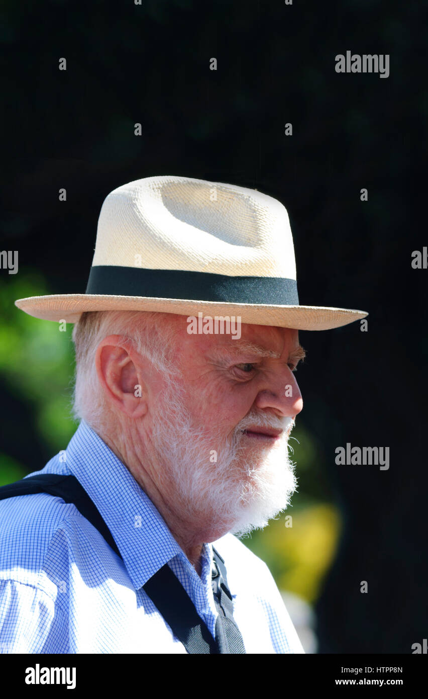 Mature bearded male spectator wearing a white hat at Kiama Jazz & Blues Festival 2017, Illawarra Coast, New South Wales, NSW, Australia Stock Photo