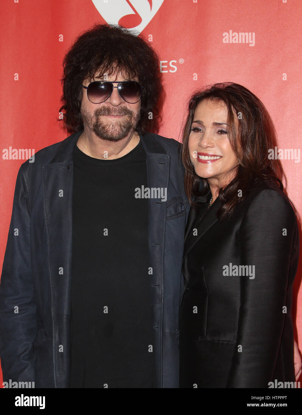 59th GRAMMY Awards - MusiCares Person of the Year Honoring Tom Petty - Arrivals  Featuring: Jeff Lynne, Sani Kapelson Lynne Where: Los Angeles, California, United States When: 10 Feb 2017 Stock Photo