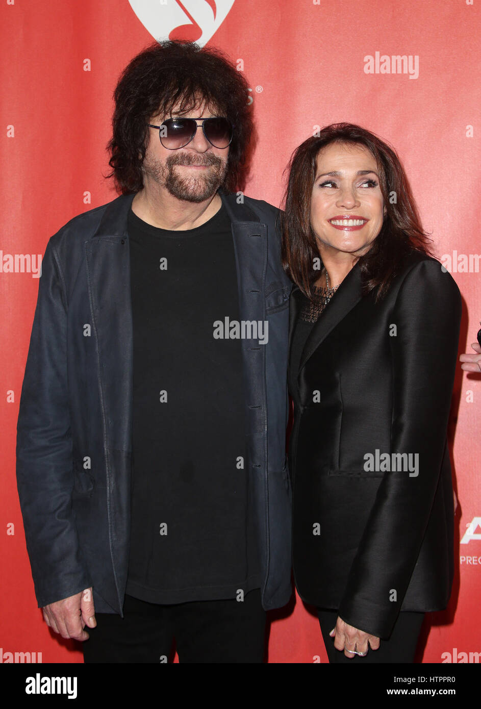 59th GRAMMY Awards - MusiCares Person of the Year Honoring Tom Petty - Arrivals  Featuring: Jeff Lynne, Sani Kapelson Lynne Where: Los Angeles, California, United States When: 10 Feb 2017 Stock Photo