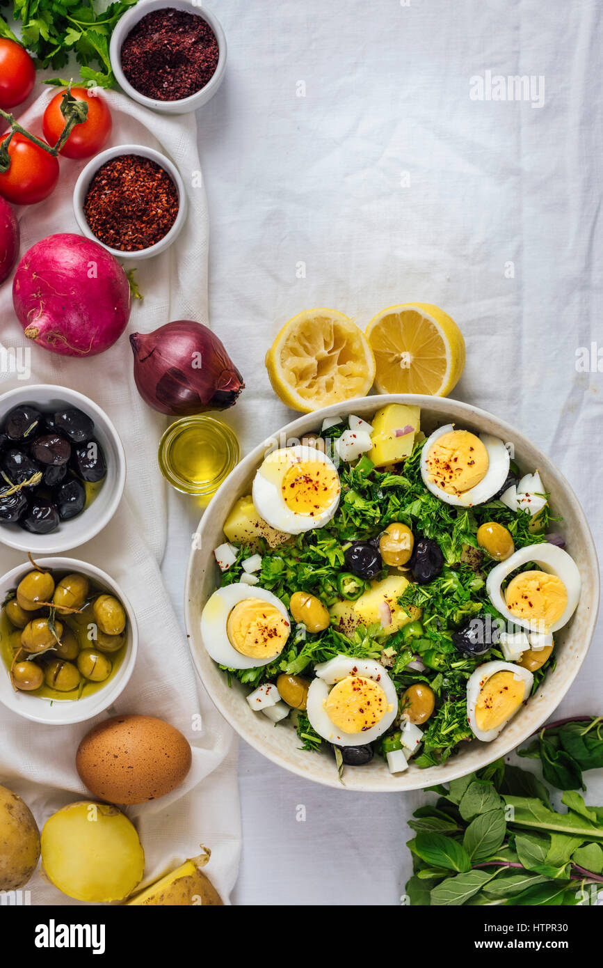 Mediterranean style potato salad with herbs and hard boiled eggs