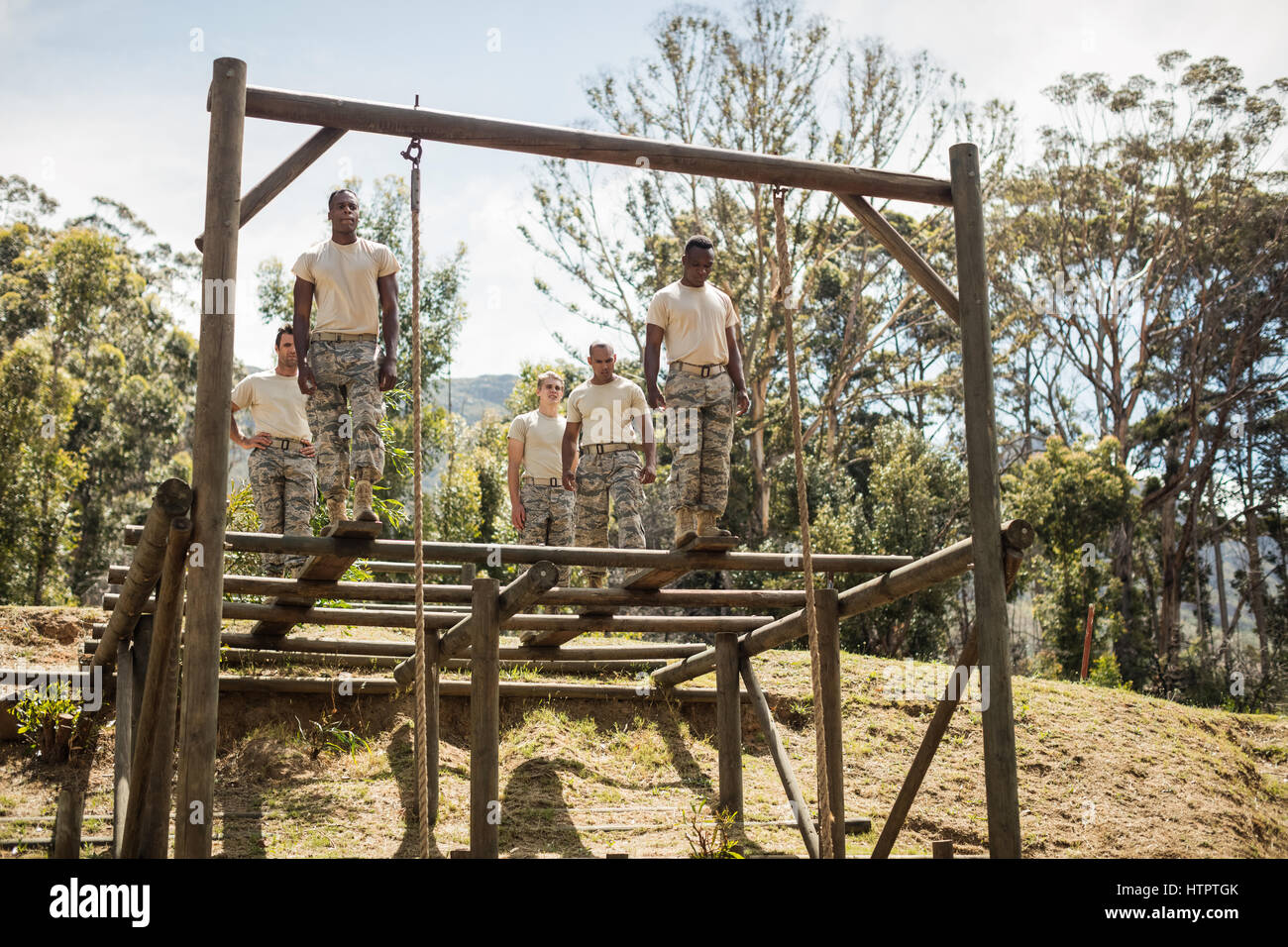 Military soldiers training rope climbing at boot camp Stock Photo Alamy