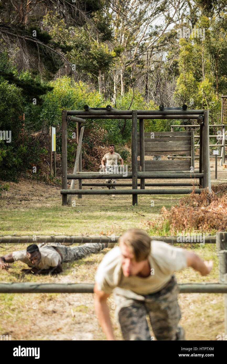 Soldiers training in obstacle course in boot camp Stock Photo Alamy