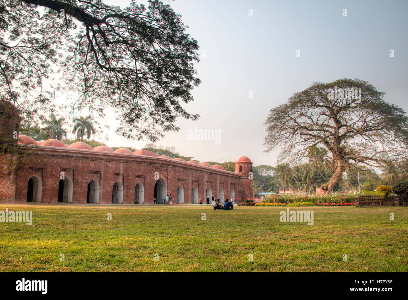 BAGERHAT, BANGLADESH - FEBRUARY 2017: Shait Gumbad Mosque in Bagerhat, Bangladesh, built in 1459 by Khan Jahan Ali. This mosque is also called the 60  Stock Photo