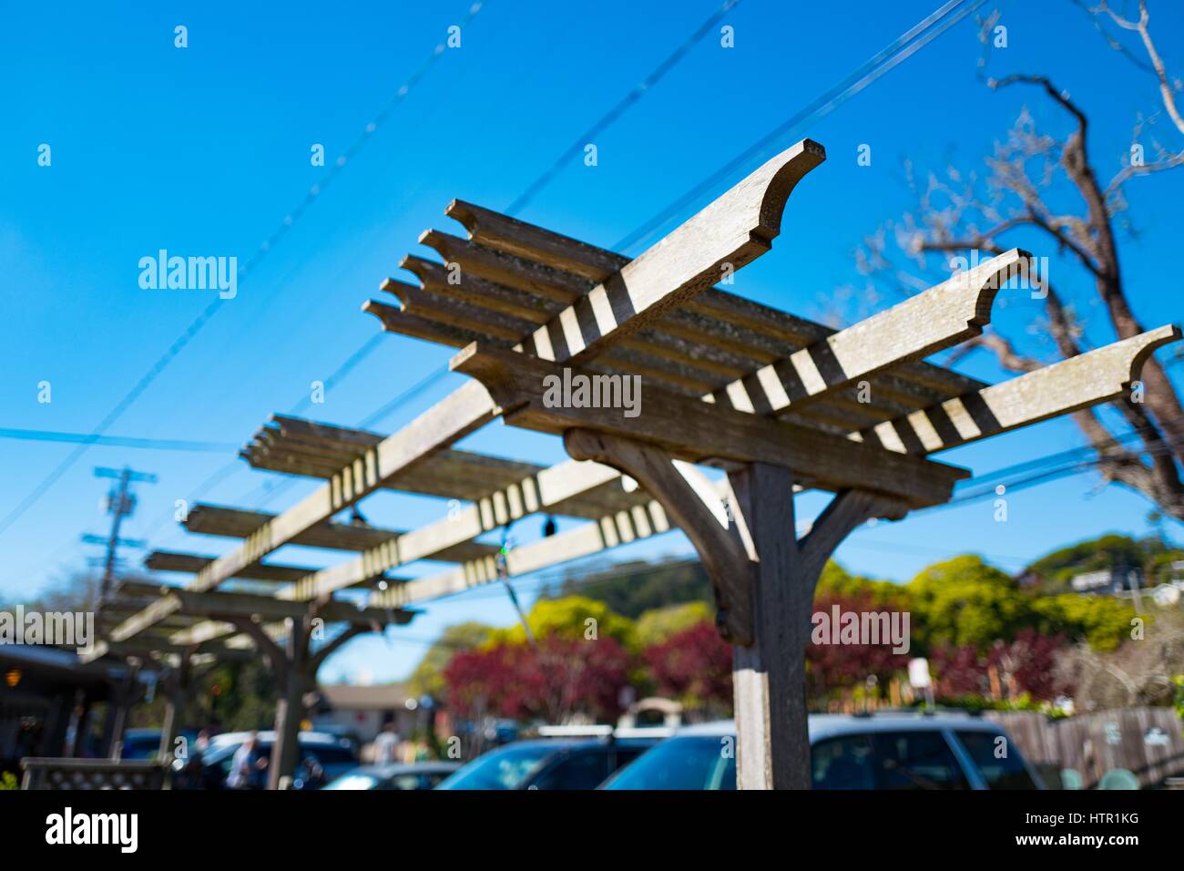 Stinson Beach, California, United States - March 12, 2017: Wooden trellis  with a parking lot visible against a blue sky on a sunny day, Stinson Beach  Stock Photo - Alamy