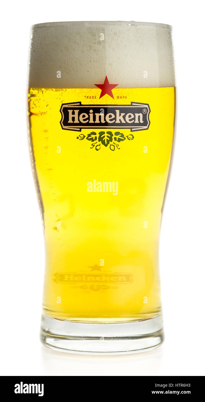 Glass of Heineken Pilsener beer isolated on a white background Stock Photo