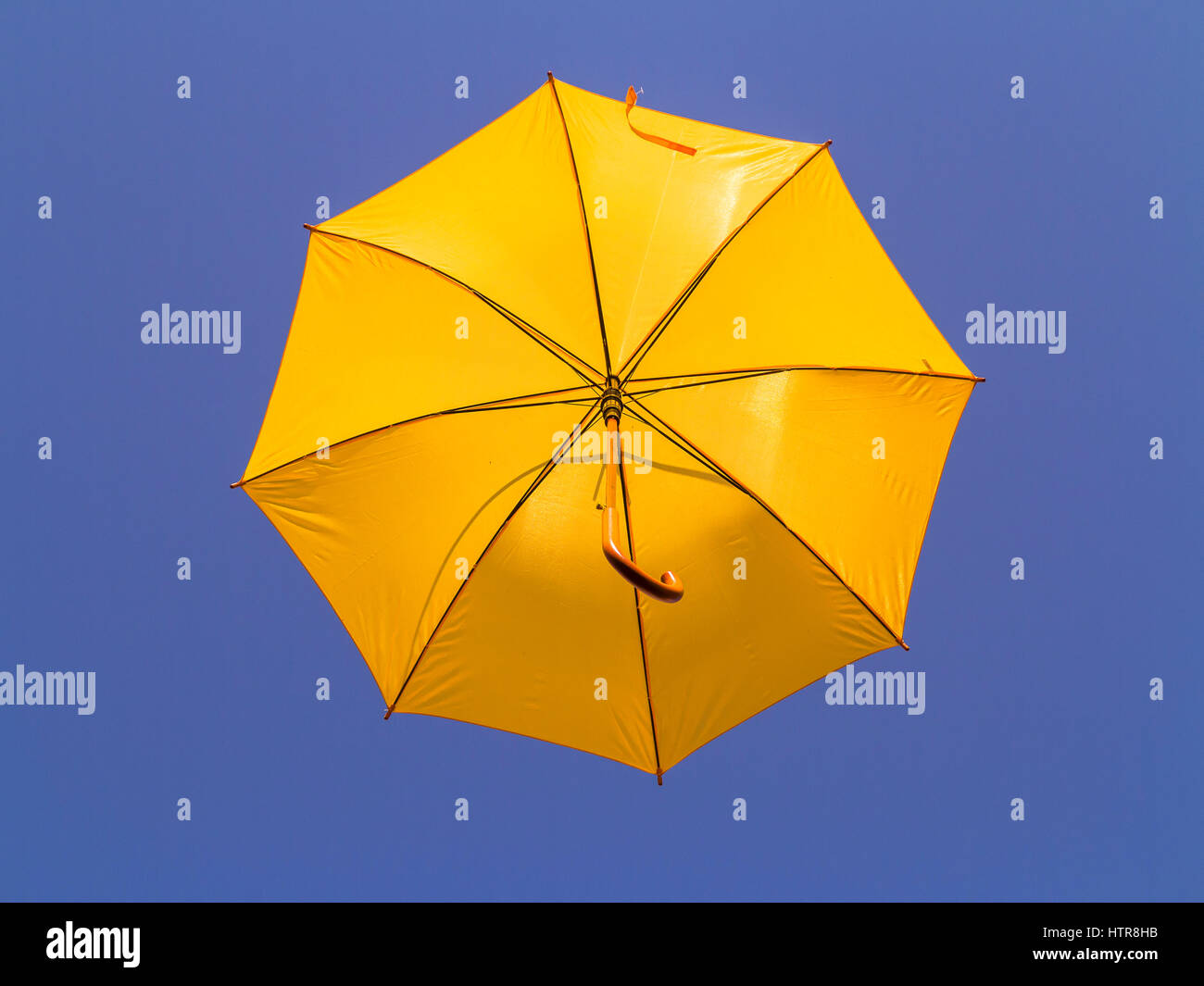 Yellow umbrella in the sky Stock Photo Alamy
