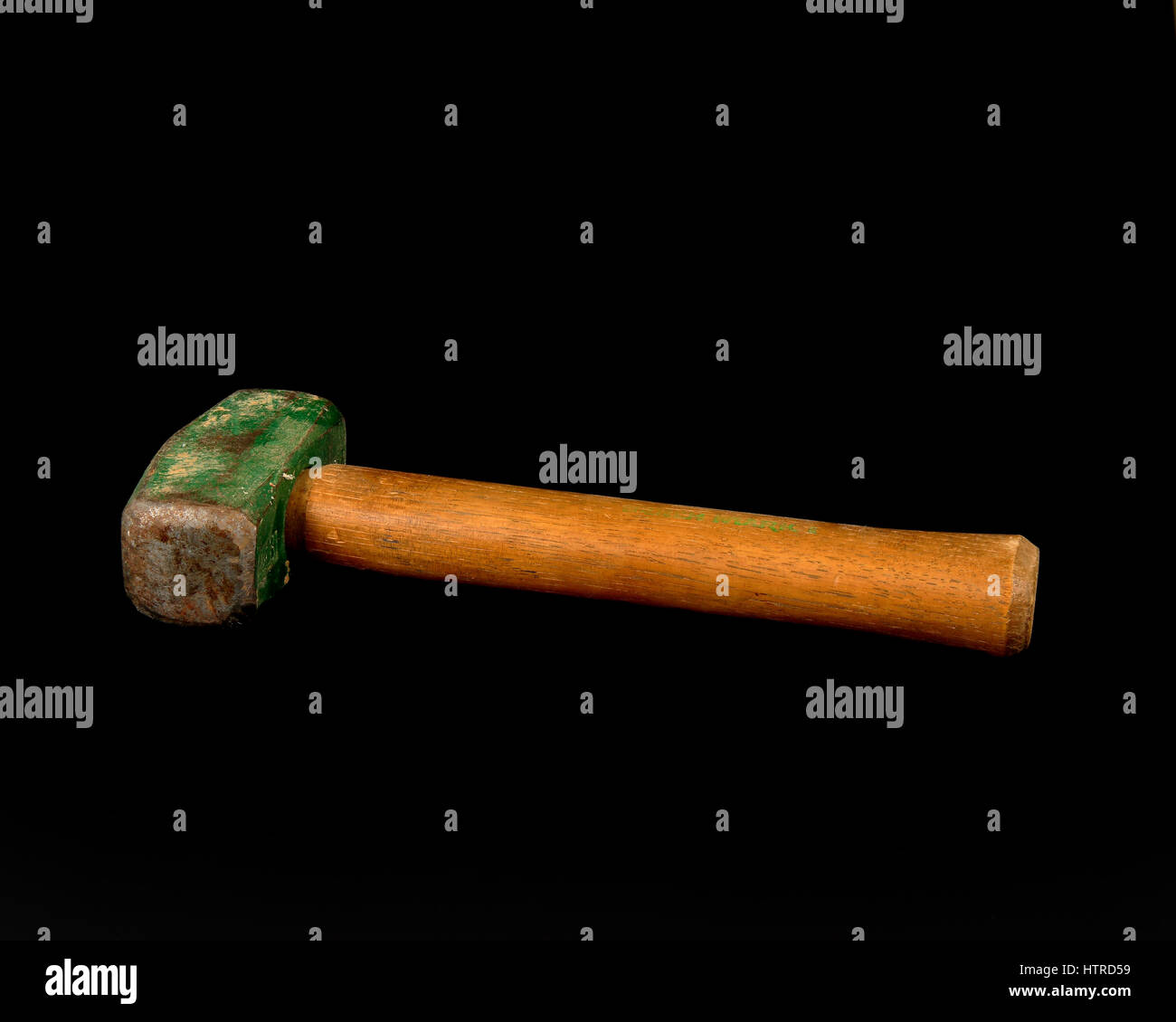 One Green headed mallet on a black background Stock Photo