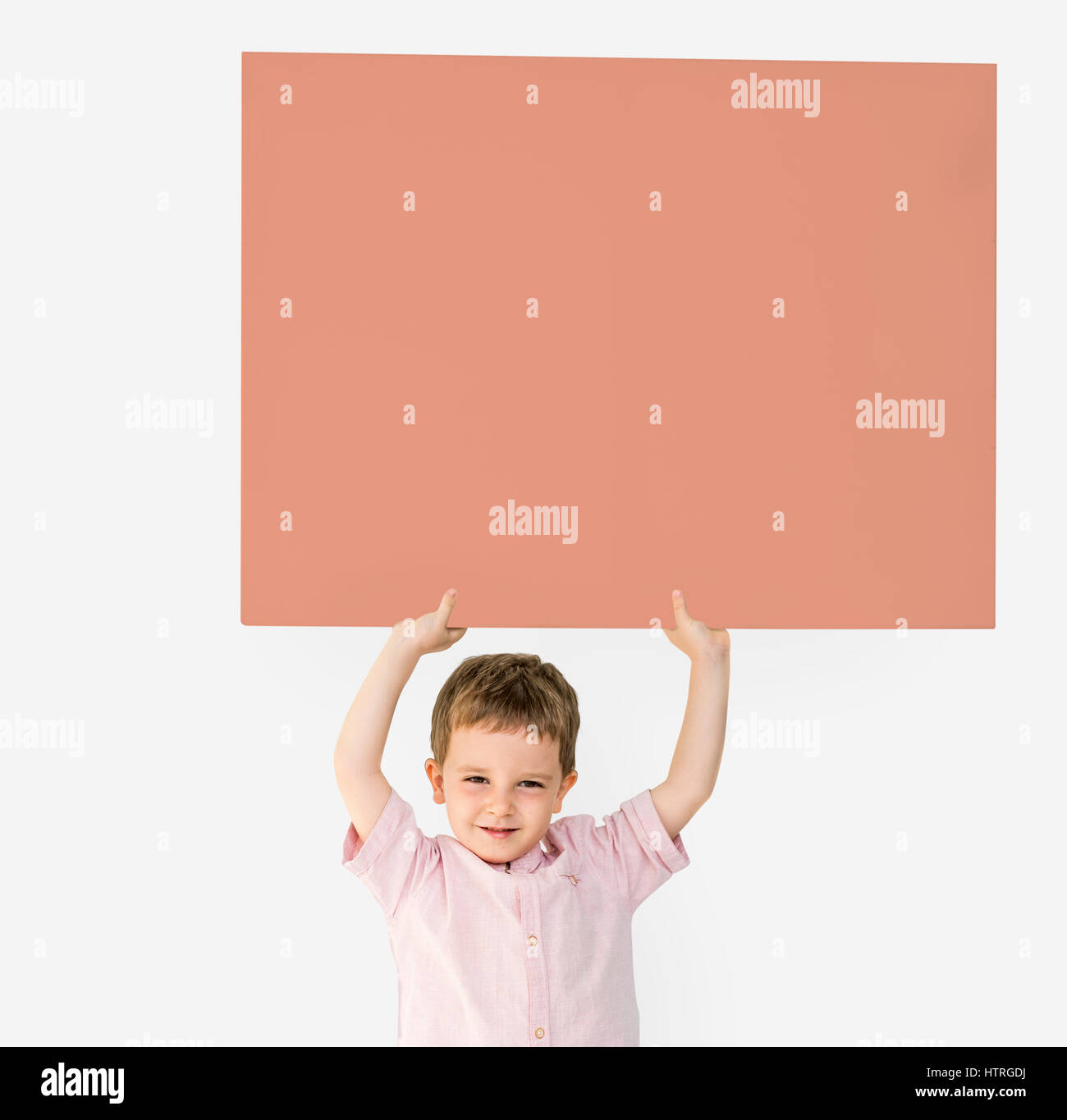 Little Boy Holding Empty Paper Smiling Stock Photo - Alamy