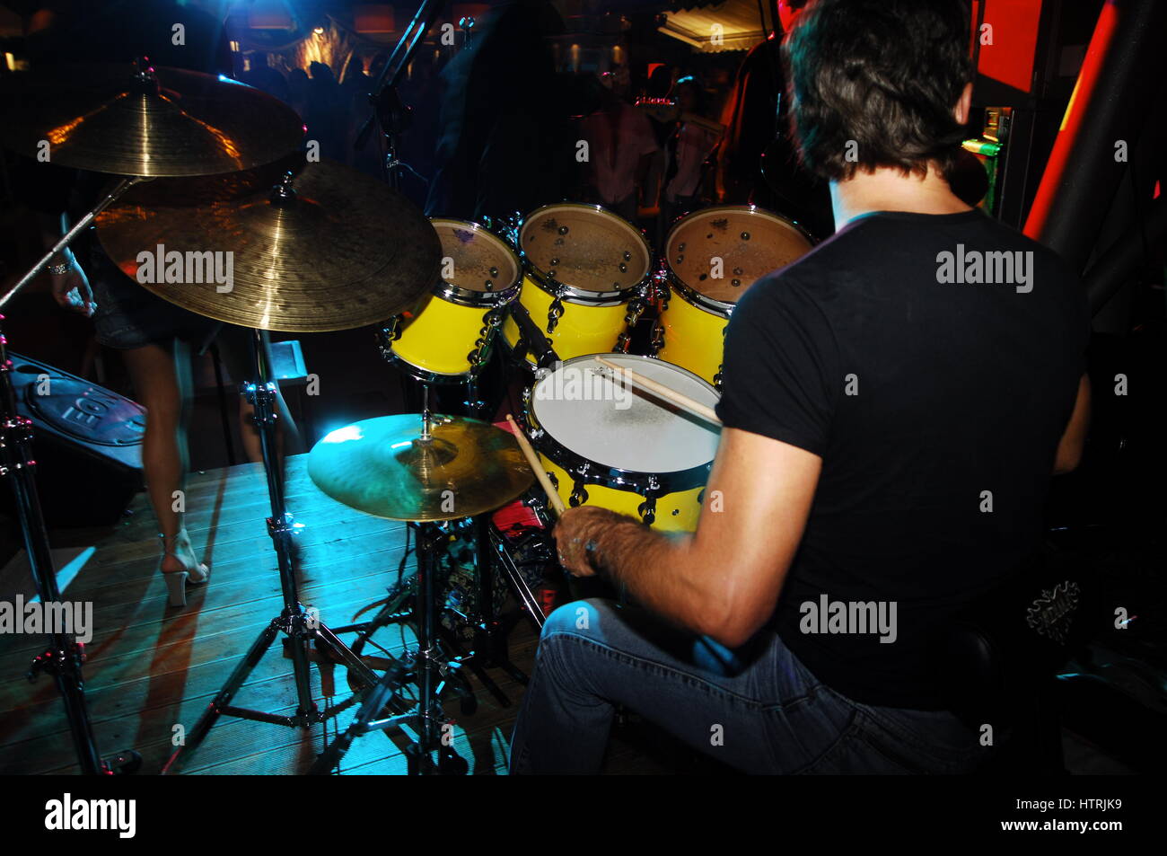 Drummer performing on stage at concert Stock Photo Alamy