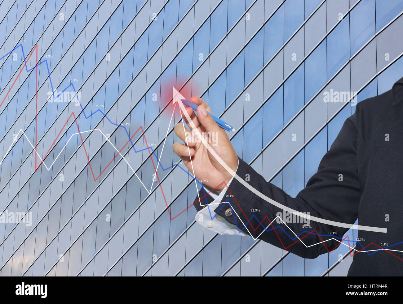 Hand of businessman use a blue pen point to top white arrow of grow ...
