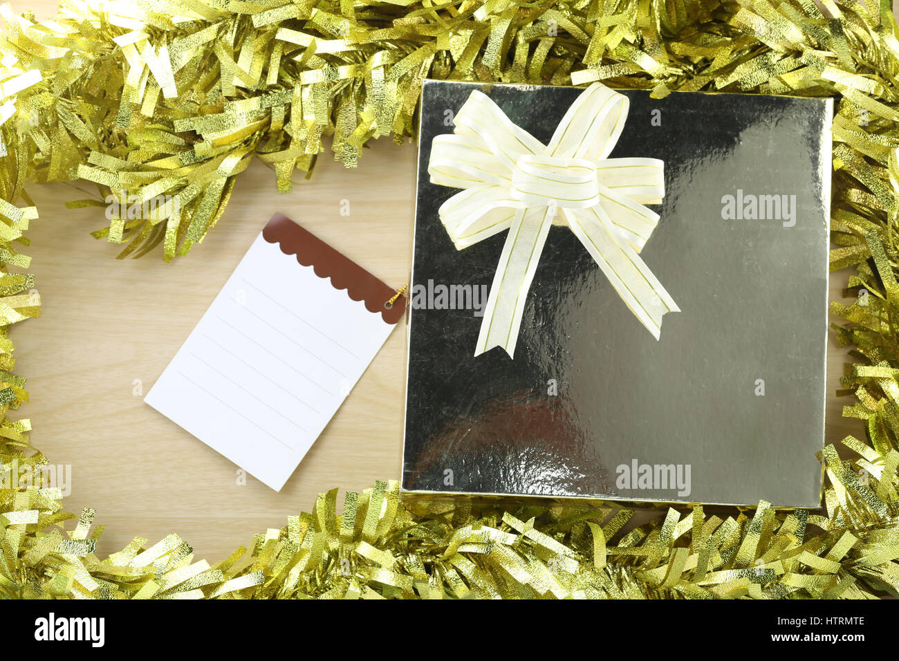 Gift box and Notepad in the concept of Christmas and New Year and special occasions. Stock Photo