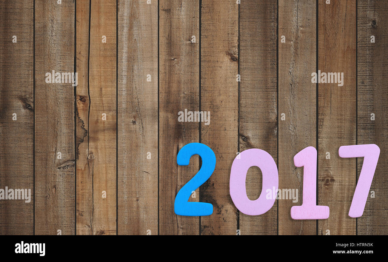 Number two thousand seven of wooden text on brown old wood floor in concept of the New Year 2017. Stock Photo