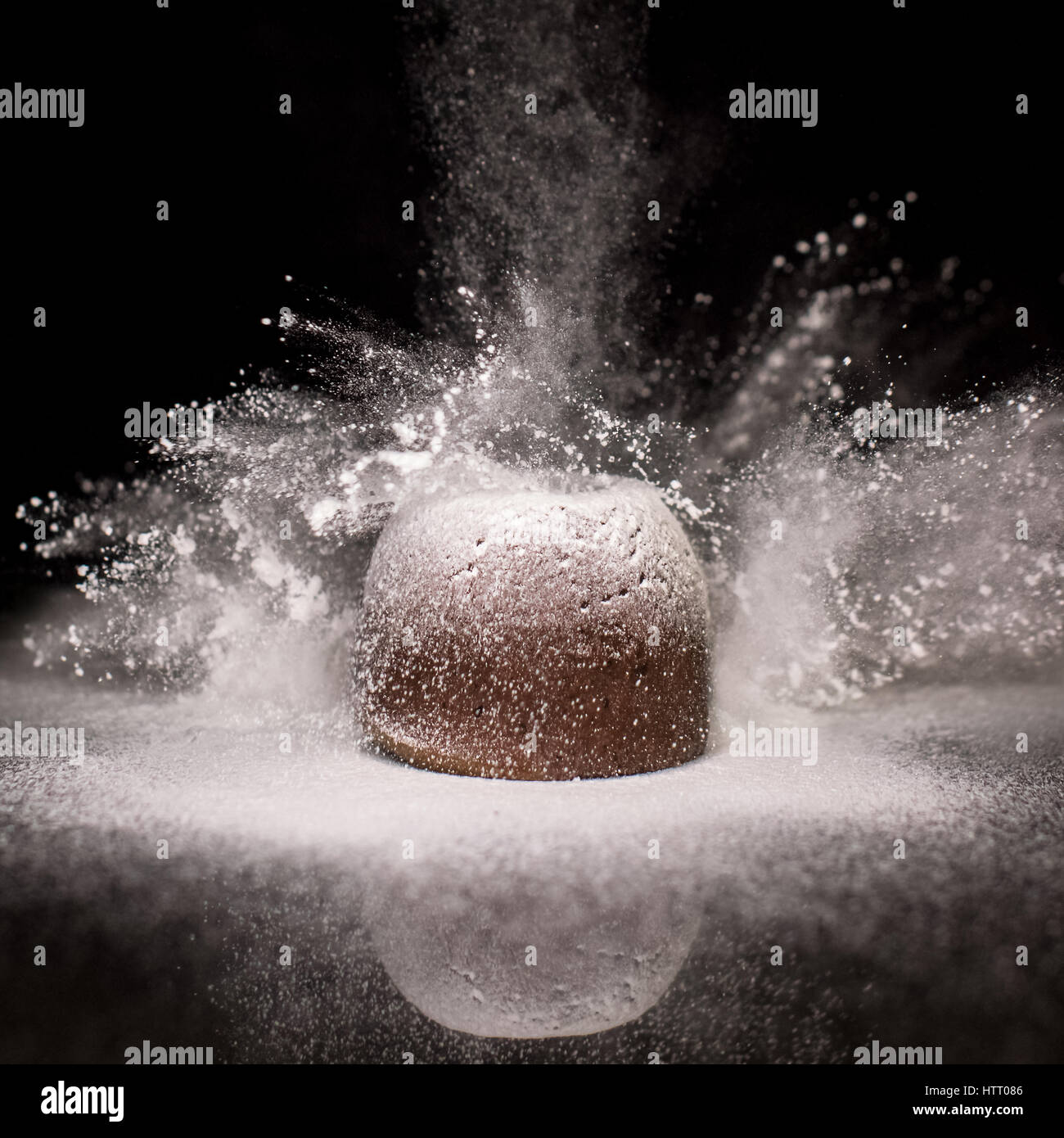 Chocolate Fondant Cake With Icing Sugar Stock Photo