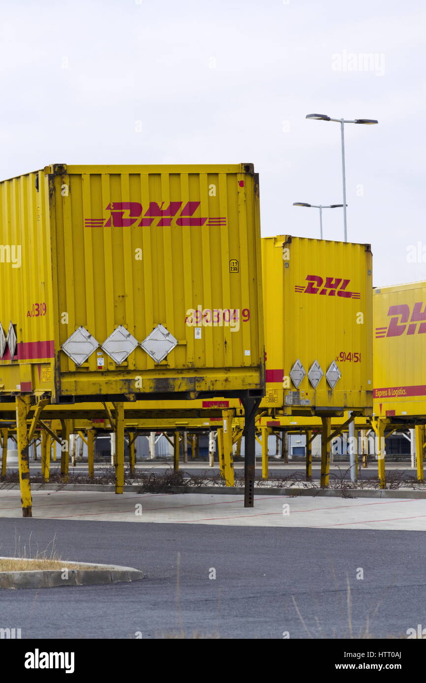 DOBROVIZ, CZECH REPUBLIC MARCH 12 DHL shipping containers in front