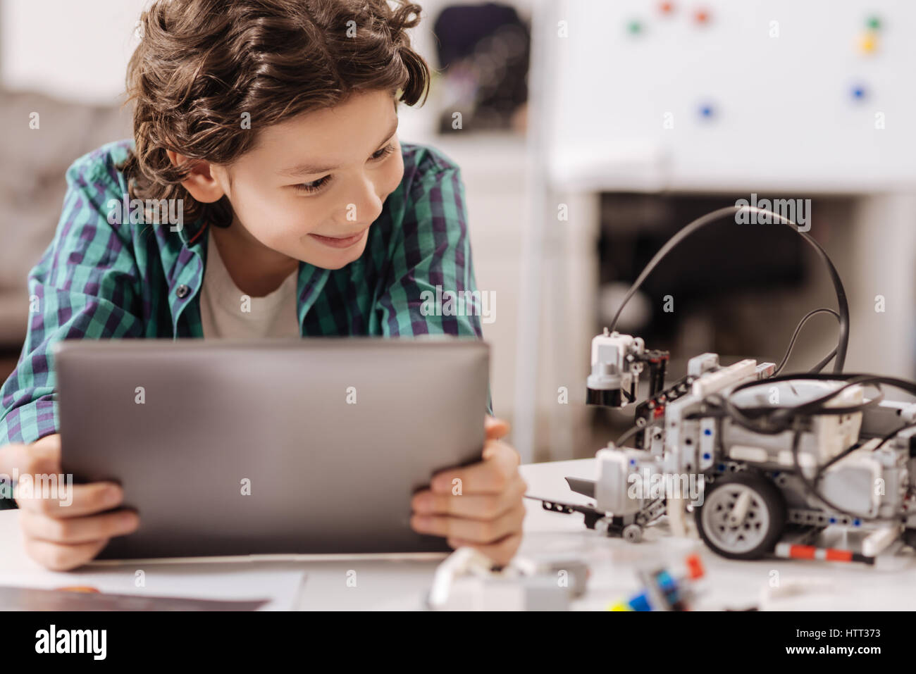 Kids Using Hardware Little kid using modern hi-res stock photography and images - Alamy