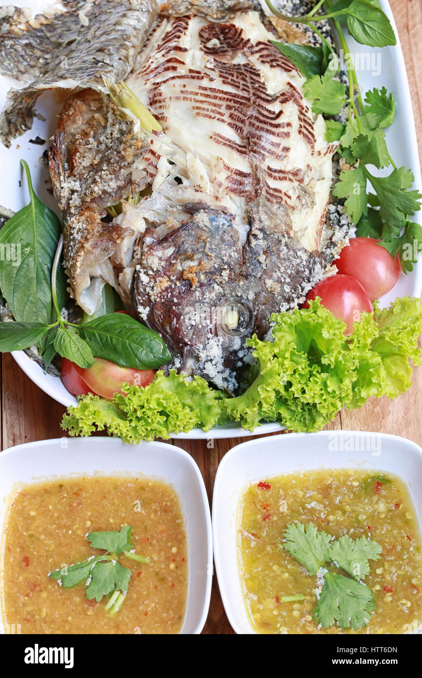 Roasted Tilapia fish of Thai foods style for design diet background