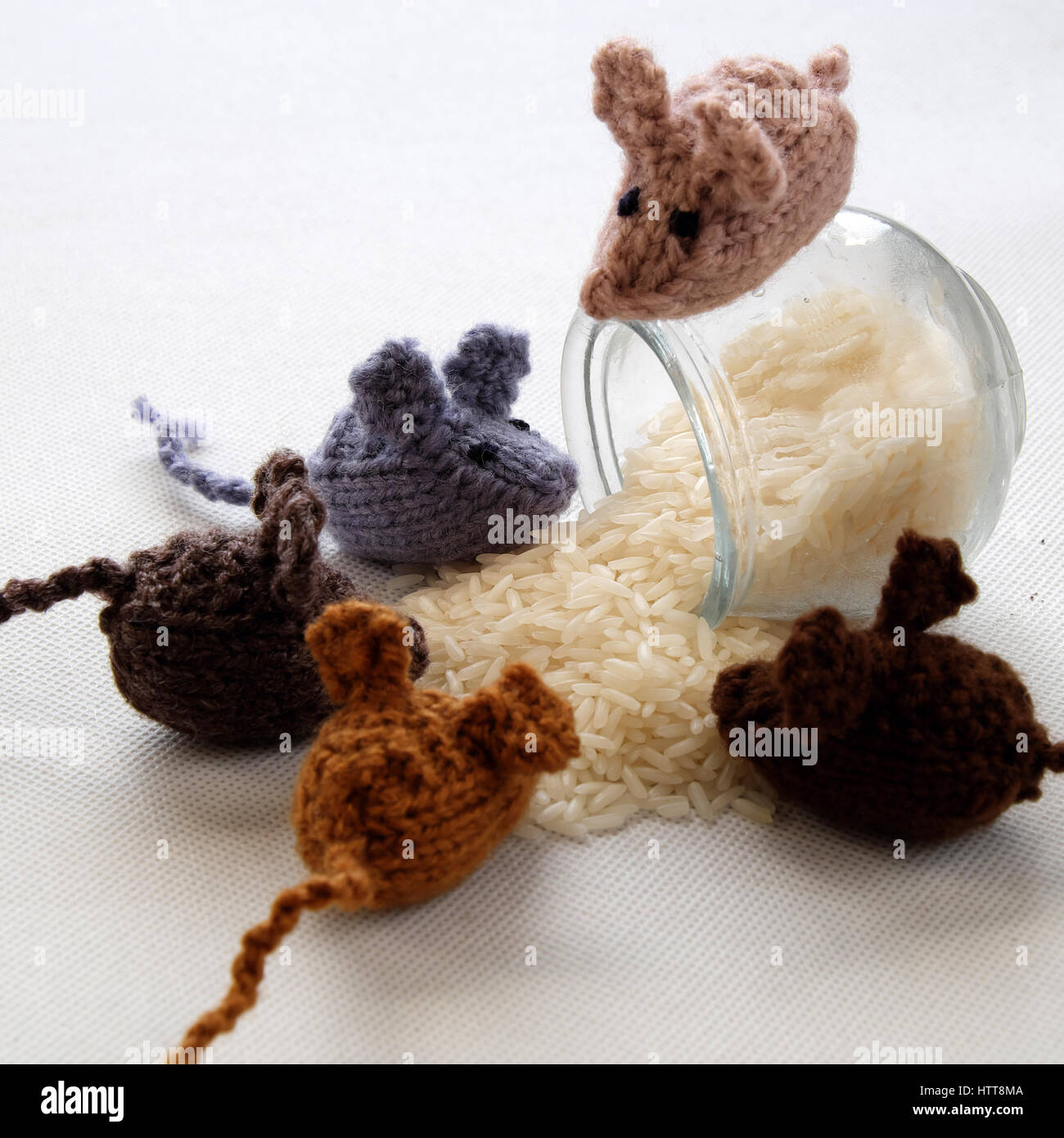 Funny concept from handmade product, group of tiny mice eat rice
