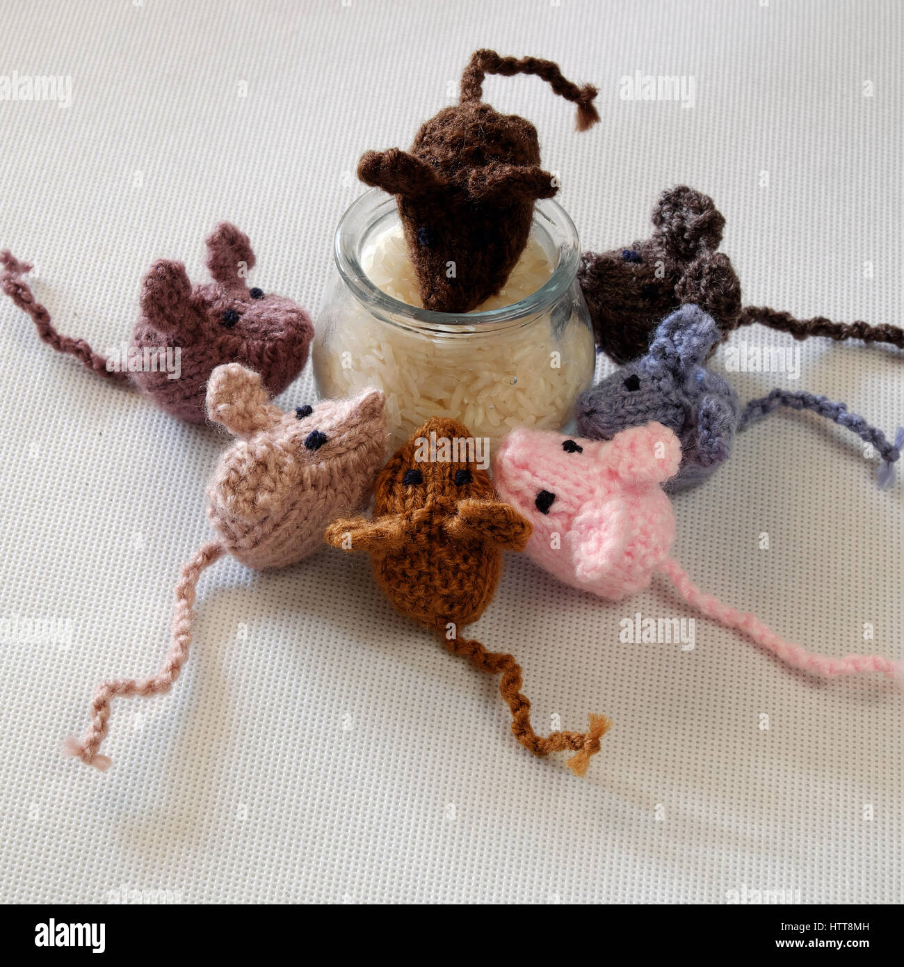 Funny concept from handmade product, group of tiny mice eat rice