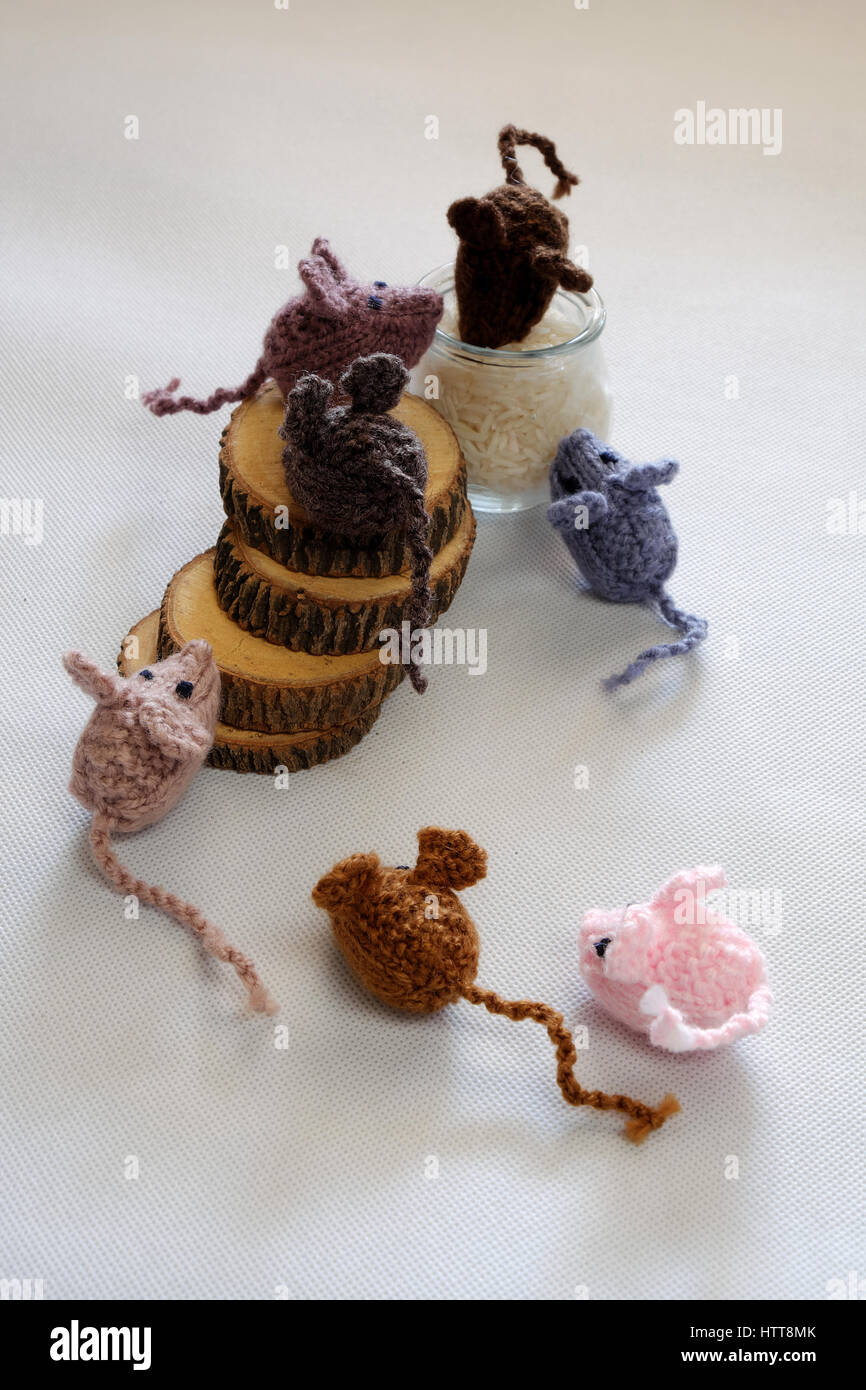 Funny concept from handmade product, group of tiny mice eat rice