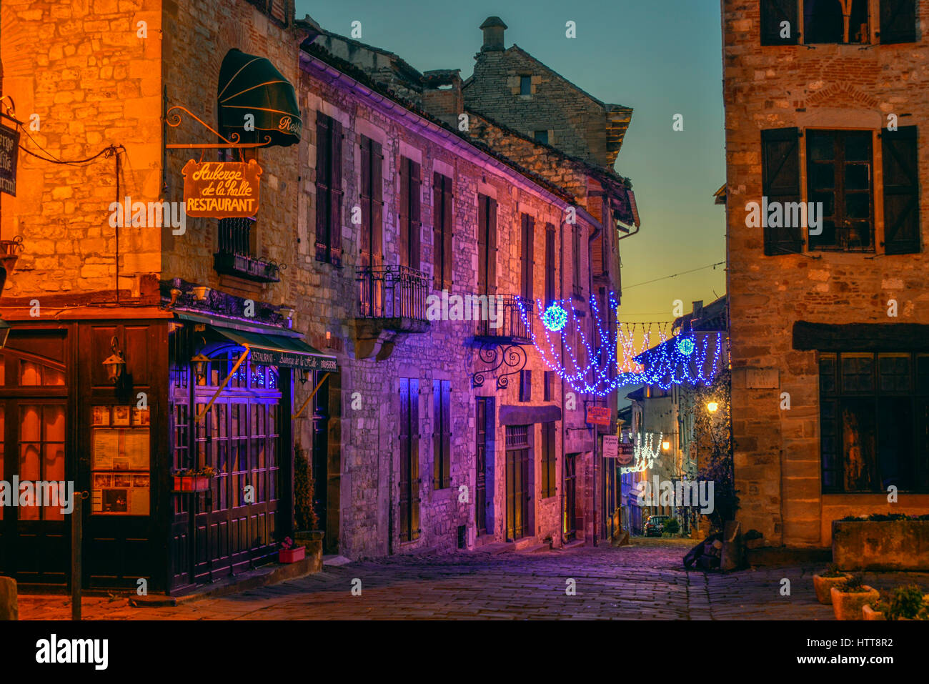 Night view of the medieval hilltop village of Cordes-sur-Ciel, in the Occitanie region of Southern France Stock Photo