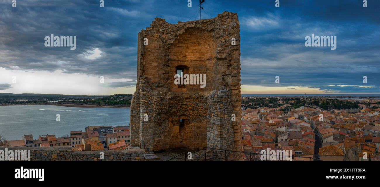 Panorama of the ruins of the Red Beard (Barbarossa) tower overlooking the coastal town of Gruissan, in the Occitanie region of southern France. Stock Photo