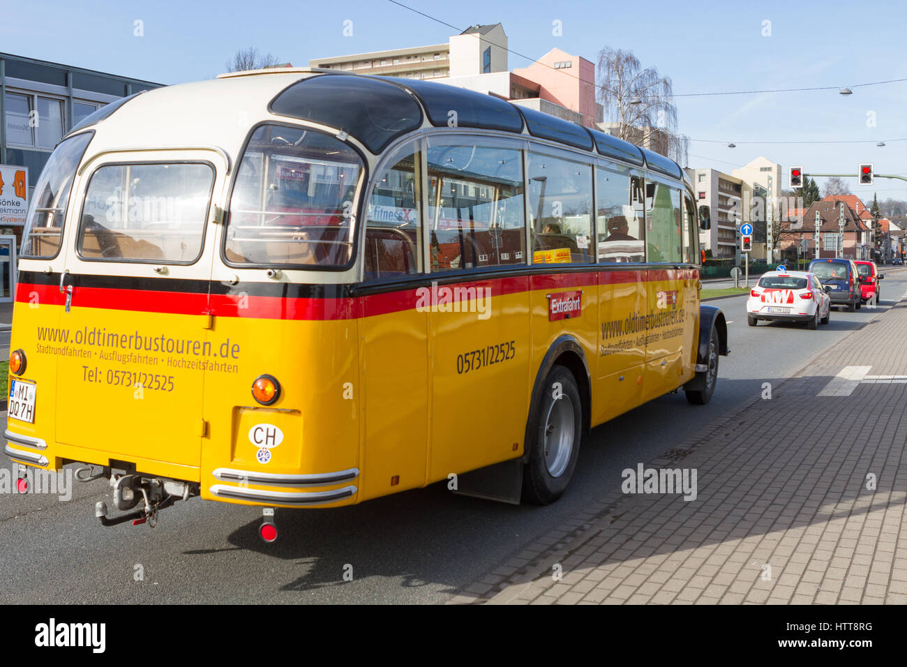 1955 Saurer Alpenpostbus L4  CT2D/55 classic vintage bus/coach operated by oldtimerbustouren.de driving in Bielefeld, Germany Stock Photo