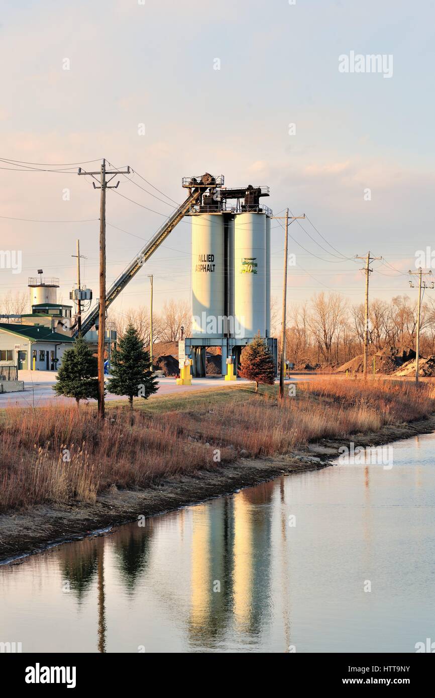Storage tanks at an asphalt manufacturing business in an industrial