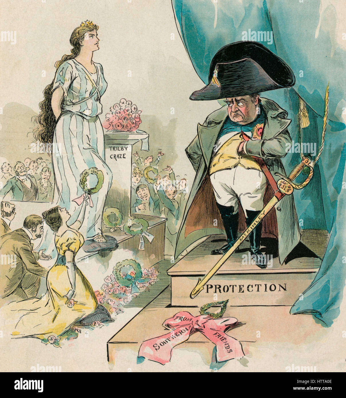 Political Cartoon shows William McKinley as Napoleon I, wearing the hat, coat, and sword in the style of Napoleon, standing on a pedestal labeled 'Protection', with a tiny wreath labeled 'From Southern Friends' lying on the base. On the left, a large female figure wearing a striped dress, stands on a platform next to a pedestal labeled 'Trilby Craze'; a group of people place wreaths of 'Adoration' at her feet. 1895 Stock Photo