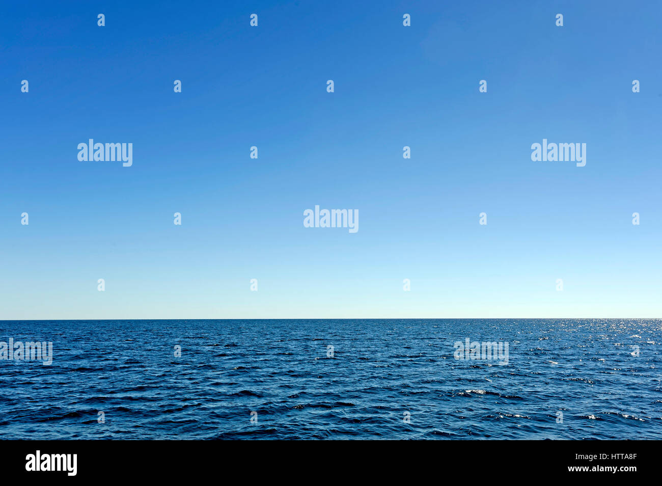 BLUE SEA BLUE SKY SUNSHINE Stock Photo