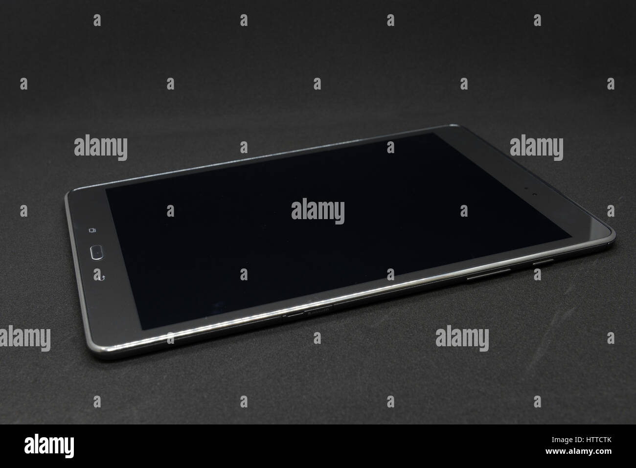 Single shutdown tablet on the floor Stock Photo Alamy