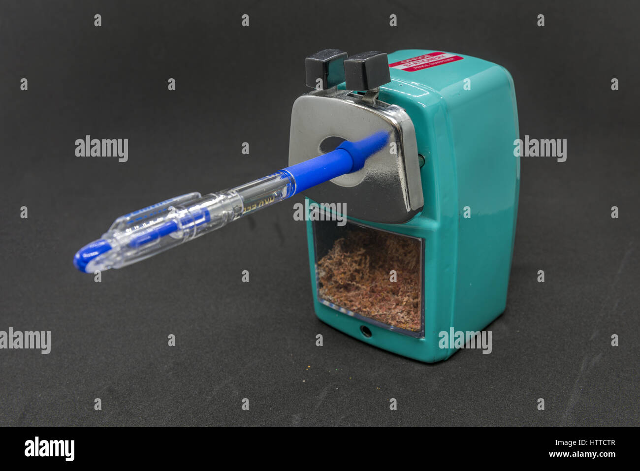 A pencil sharpener isolated with pen inside Stock Photo Alamy