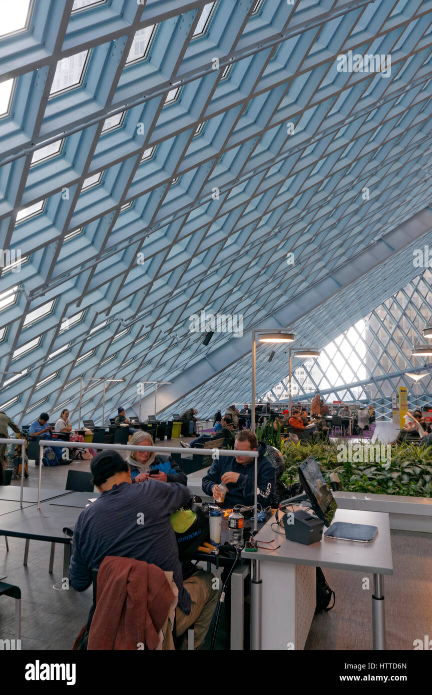People seated  in the Living Room on Level 3  of Seattle Central Library building in downtown Seattle, Washington state, USA Stock Photo