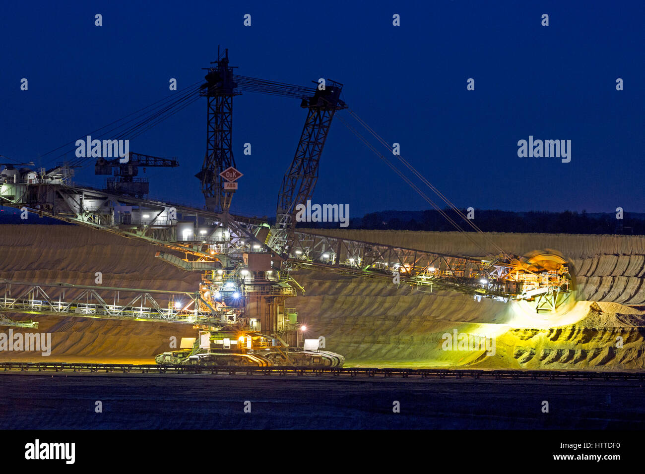 Bucket-wheel excavator in the Garzweiler open-cast lignite mineat night Garzweiler, North Rhine-Westphalia, Germany, Europe Stock Photo