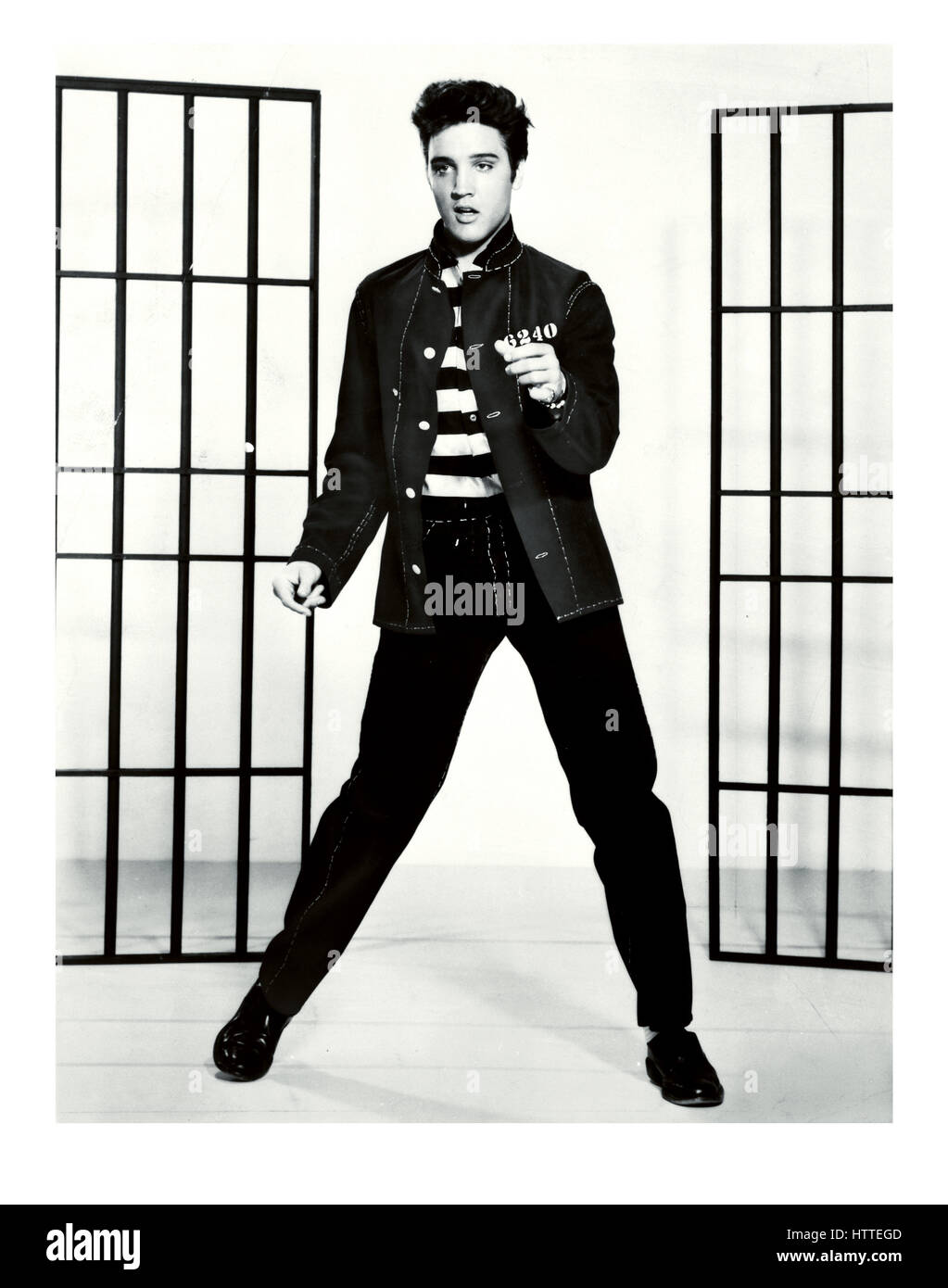 Elvis Presley 1950s film still from Movie & Song 'Jailhouse Rock' 1957 The song lyrics start... 'Warden threw a party in the County Jail' Stock Photo
