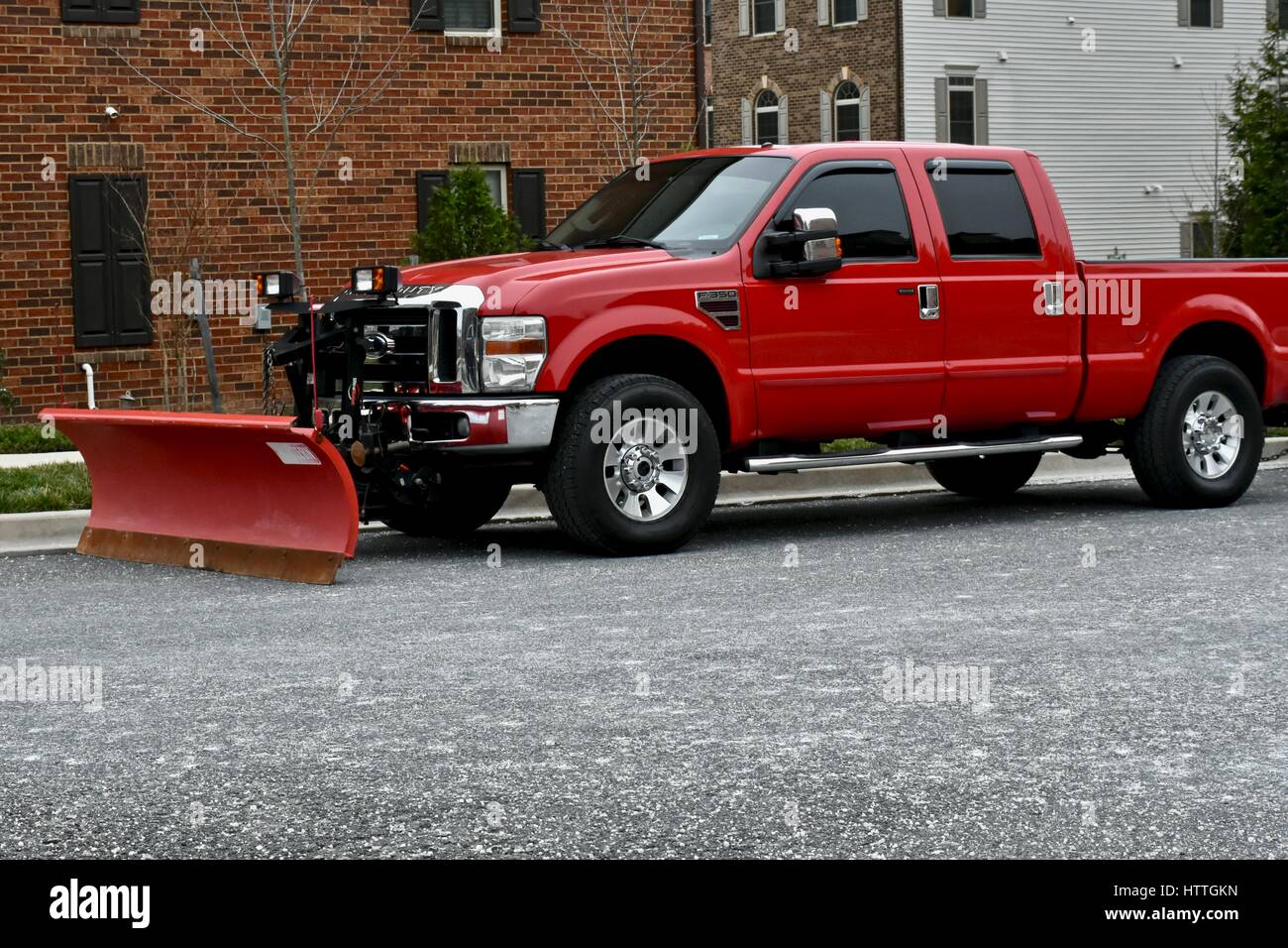 Ford pickup truck with snow plow attachment Stock Photo