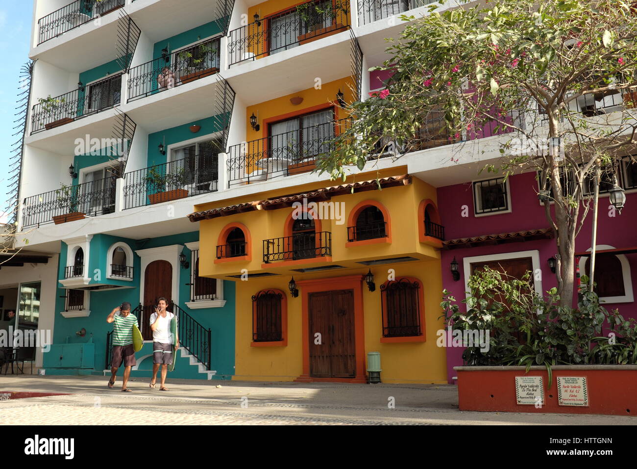 Two males on the way to the beach in Puerto Vallarta, Mexico Stock Photo