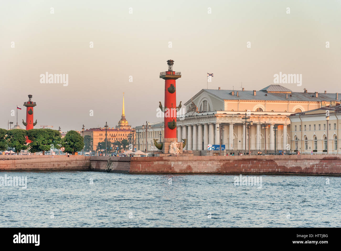 Old Saint Petersburg Stock Exchange and Rostral Columns on Spit of Vasilyevsky Island Stock Photo