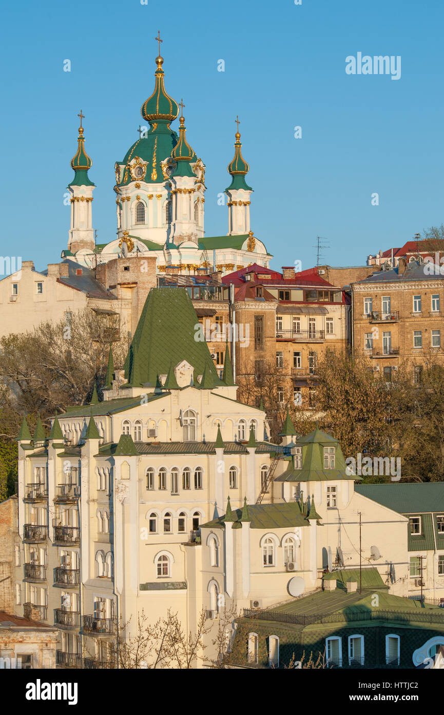 Famous St Andrew church and descent with artistic fare in Podol, historic district of Kiev Stock Photo