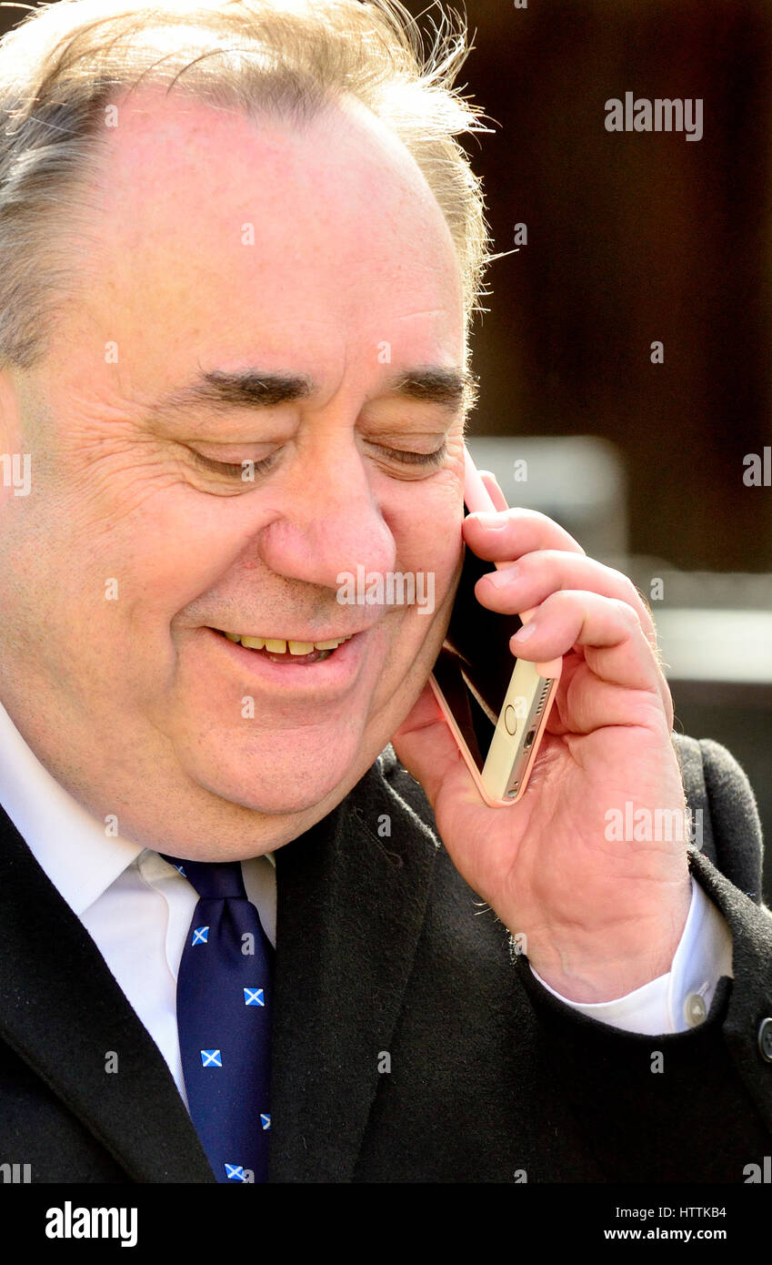 Alex Salmond MP on College Green, talking on his mobile phone March 2017 Stock Photo