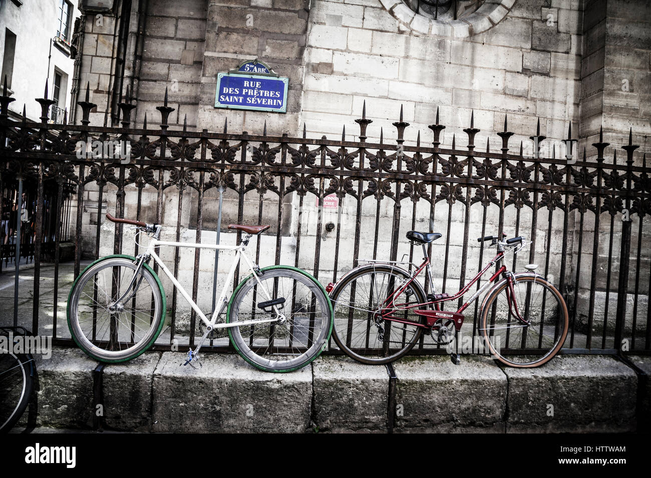Bicycle parked outside of Church St-Severin, Paris, France Stock Photo