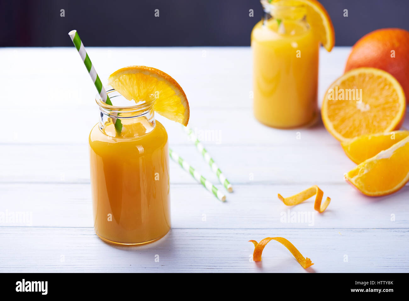 Juice In Glass Jar And Orange On Kitchen Table. Stock Photo, Picture and  Royalty Free Image. Image 14167034.