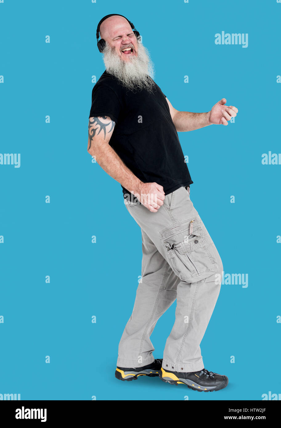 Bearded rocker guy playing air guitar portrait Stock Photo - Alamy