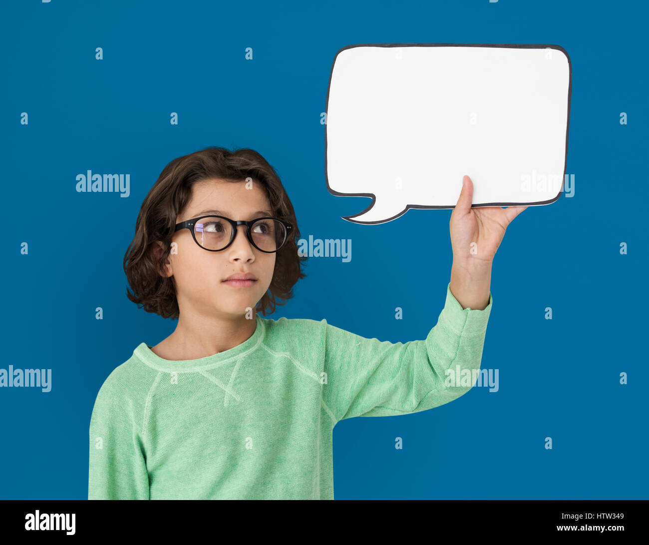 Little Boy Holding Chatbox Neutral Mood Stock Photo - Alamy