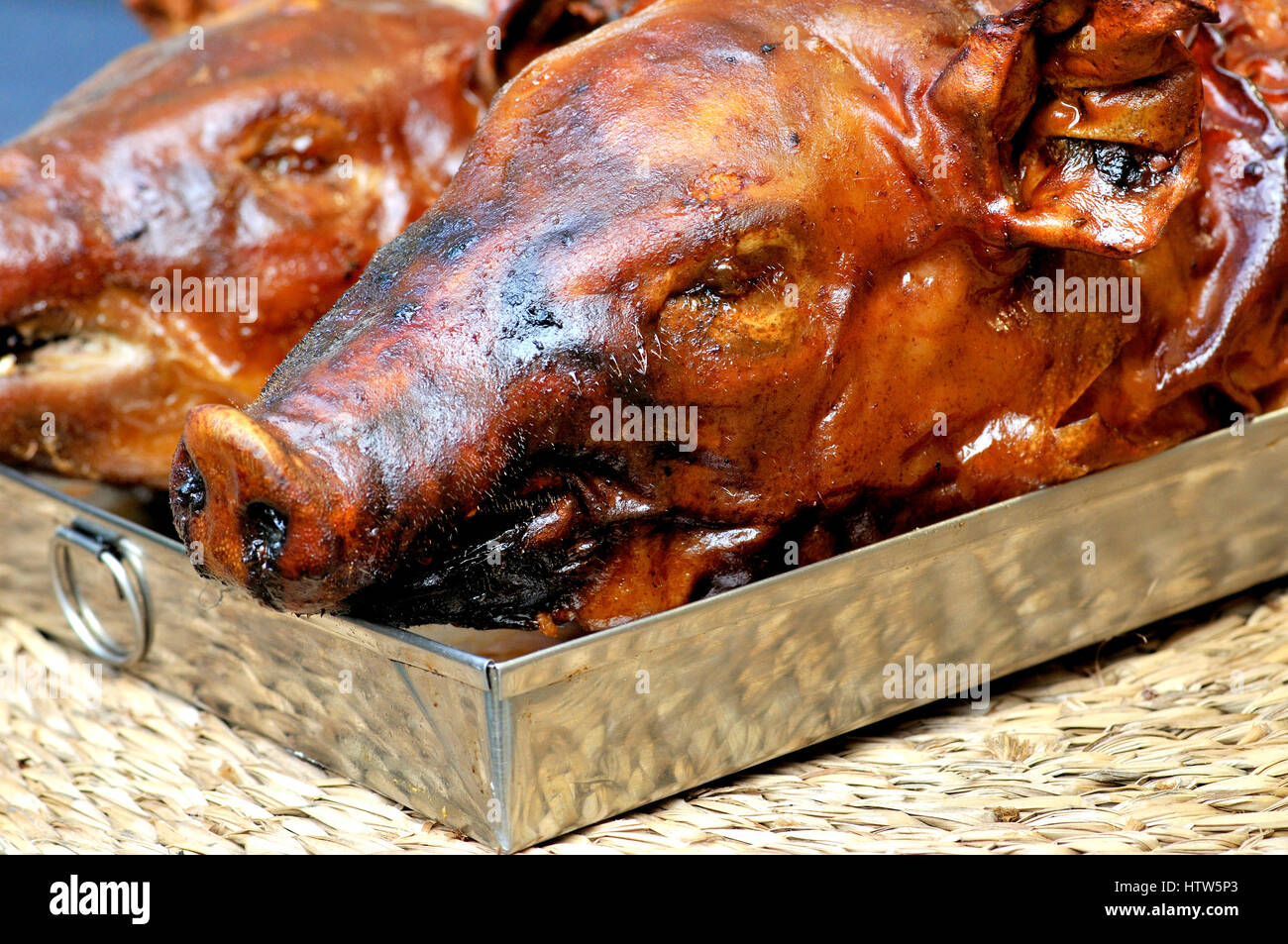 Roasted pork head Stock Photo - Alamy