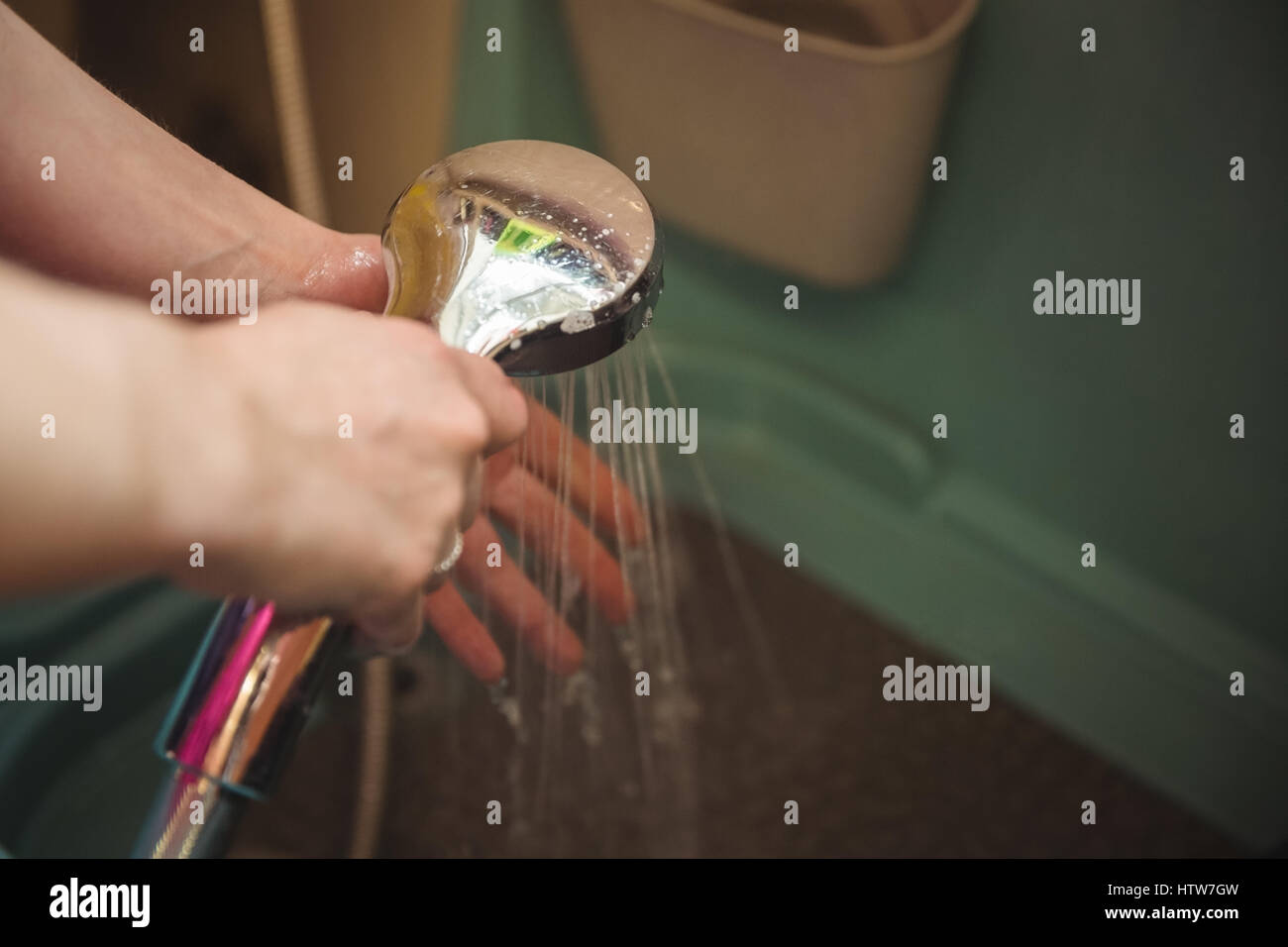 Woman washing hands after cleaning a dog in bathtub Stock Photo Alamy