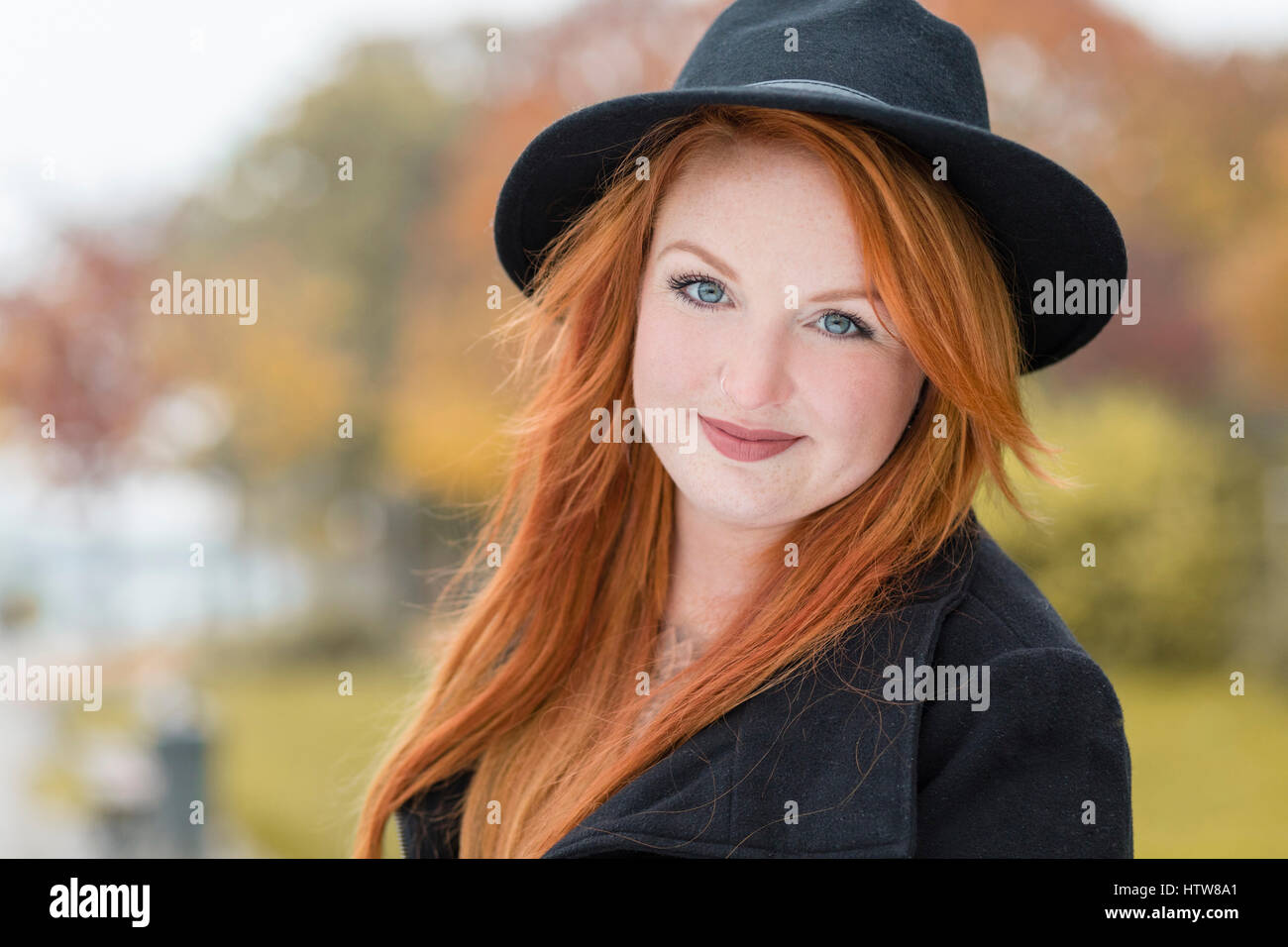 Portrait of a young woman with hat Stock Photo - Alamy