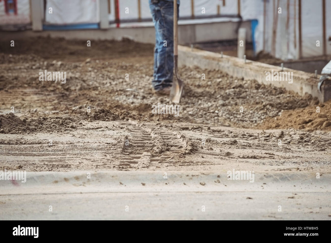 Construction worker working at construction site Stock Photo - Alamy
