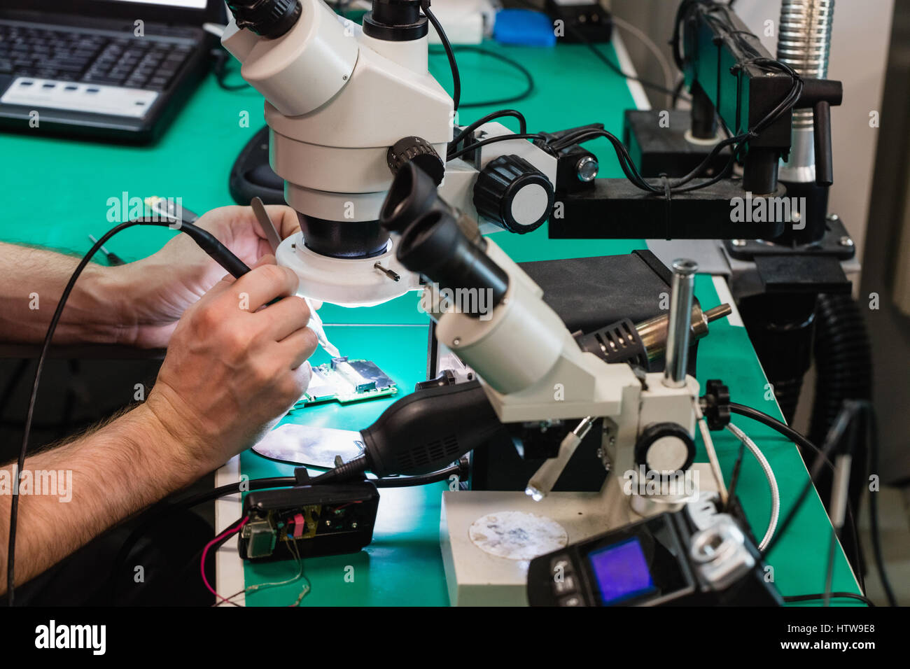Man repairing mobile phone Stock Photo Alamy