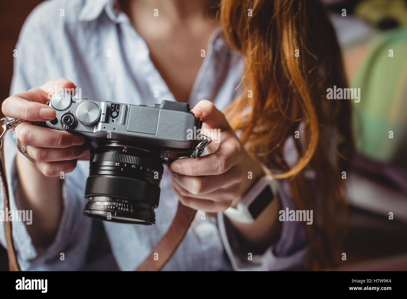 Mid adult woman looking camera hi-res stock photography and images - Alamy